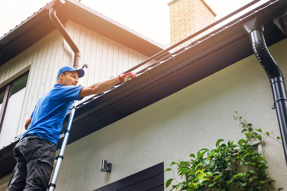 keep gutters clean to protect properties in winter
