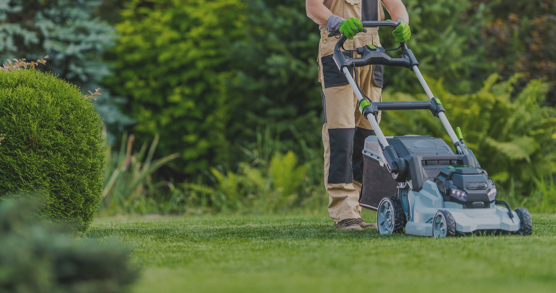 man-mowing-lawn-dark-gray-overlay